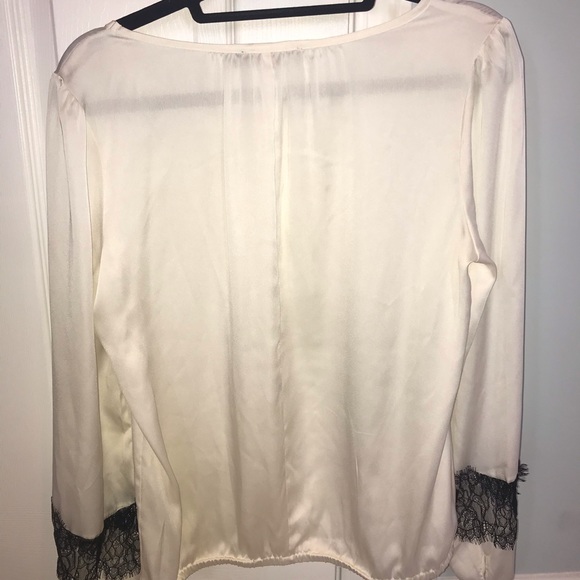 Ivory Silky Blouse with black lace sleeve. - Picture 3 of 4